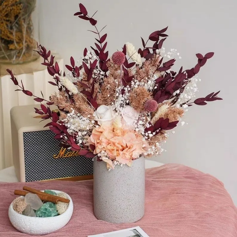 Dried Floral Arrangement in Modern Decorative Vase