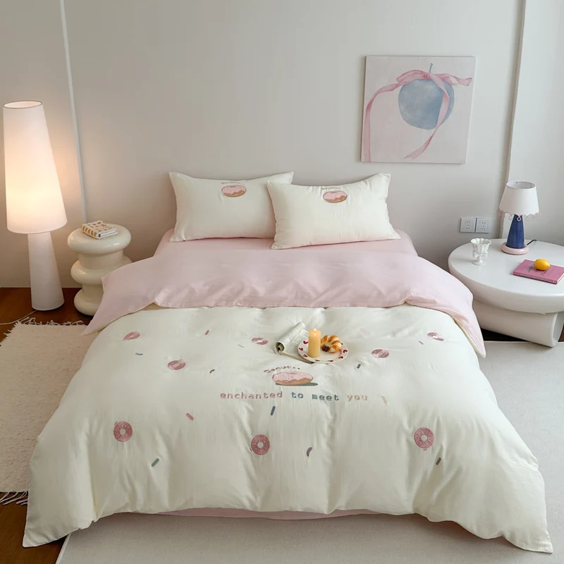 Baumwoll-Bettwäsche-Set mit gesticktem Donut-Motiv und Kissenbezügen Karnz