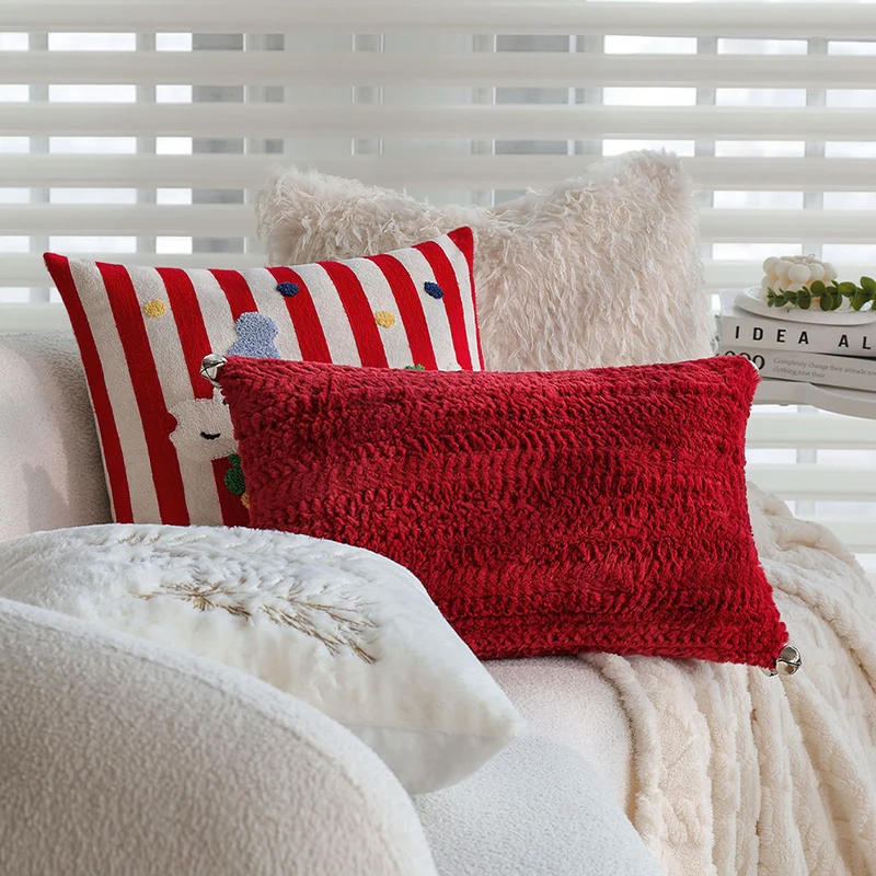 Rectangular plush decorative pillow with textured knit look and metal eyelets Stornfield