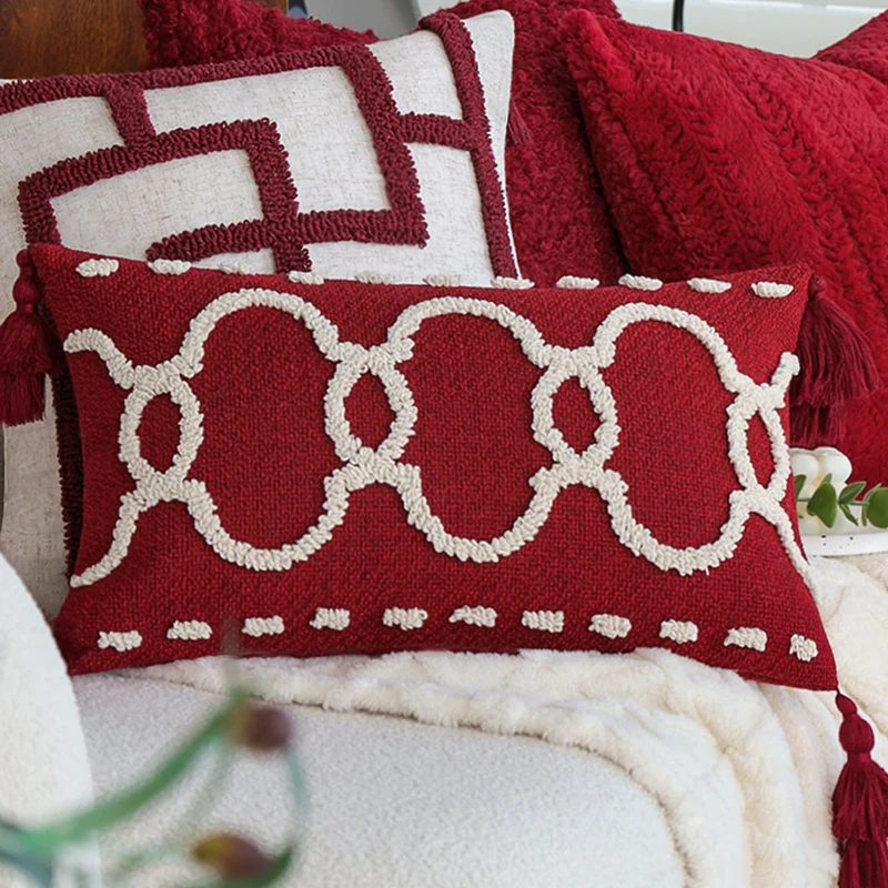 Rectangular decorative cushion with bouclé relief and tassels Stornfield