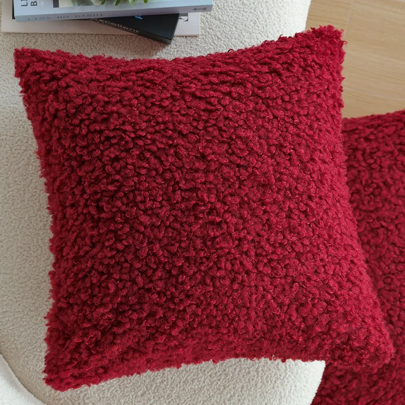Rectangular decorative cushion with bouclé relief and tassels Stornfield