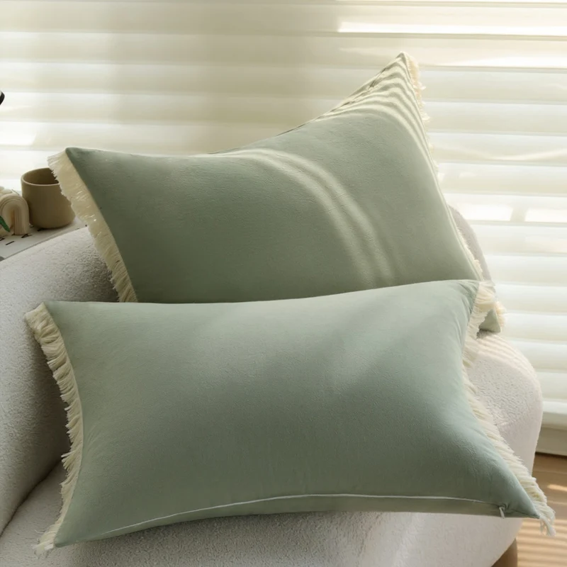 Rectangular decorative cushion cover with subtle fringes and soft cotton-linen look Stornfield
