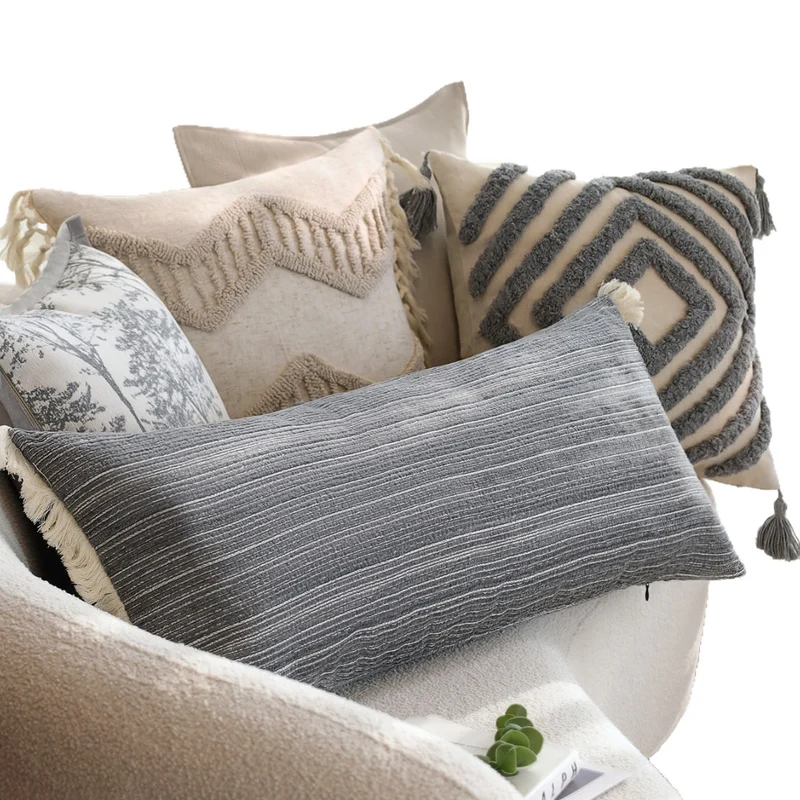 Rectangular linen look lumbar pillowcase with fine striped texture and tassels Stornfield