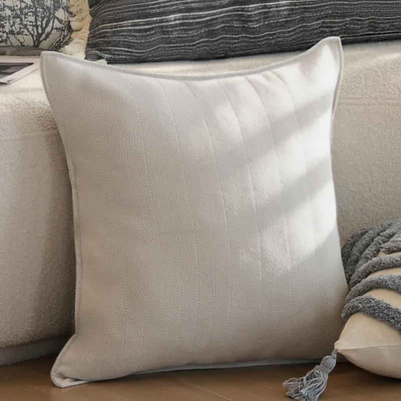 Rectangular linen look lumbar pillowcase with fine striped texture and tassels Stornfield