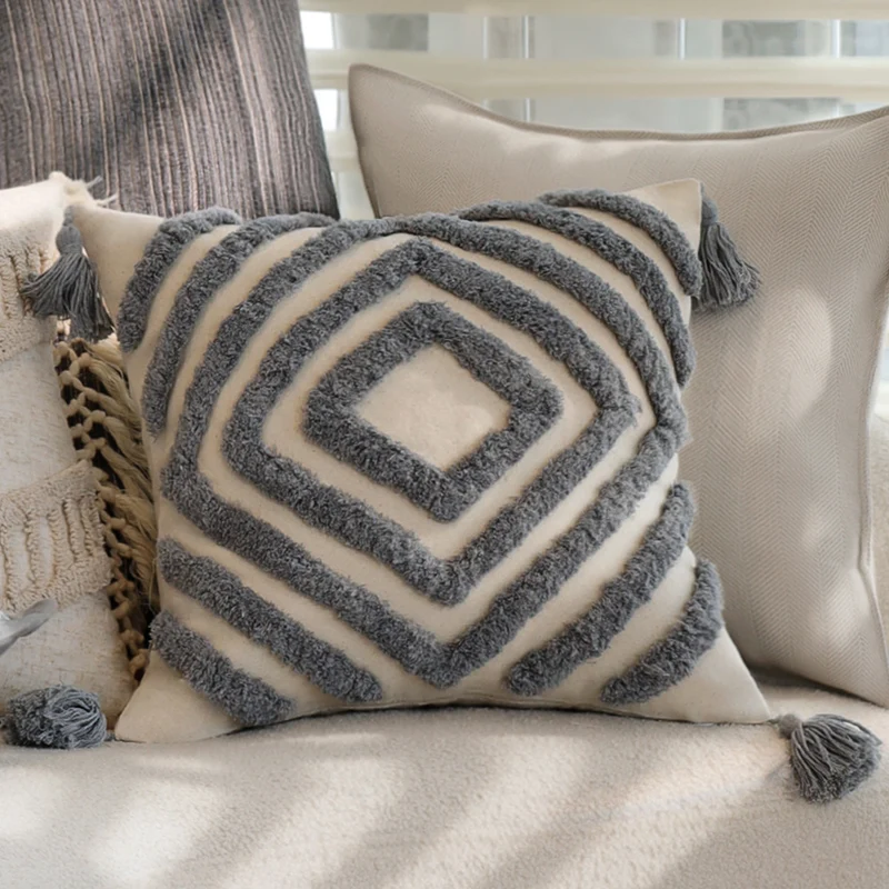 Rectangular linen look lumbar pillowcase with fine striped texture and tassels Stornfield