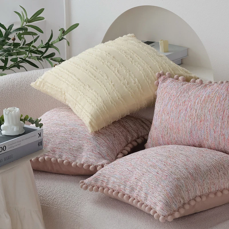 Rectangular decorative pillowcase with mottled chenille structure and pompom trim Stornfield