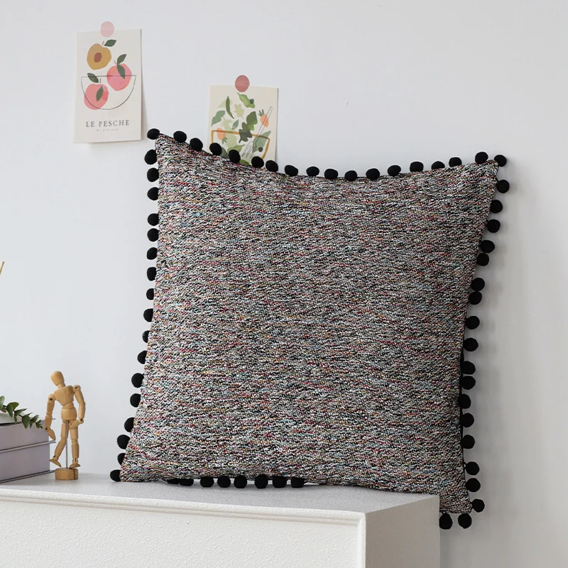 Rectangular decorative pillowcase with mottled chenille structure and pompom trim Stornfield