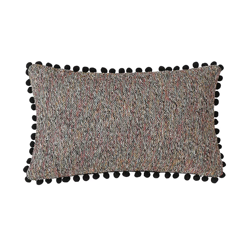 Rectangular decorative pillowcase with mottled chenille structure and pompom trim Stornfield
