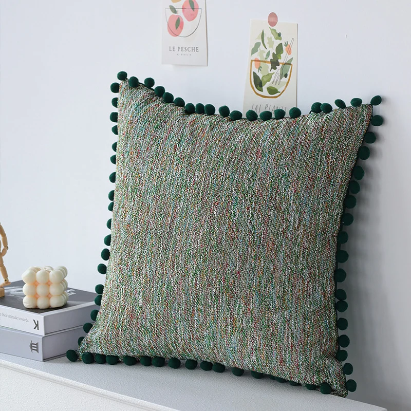 Rectangular decorative pillowcase with mottled chenille structure and pompom trim Stornfield