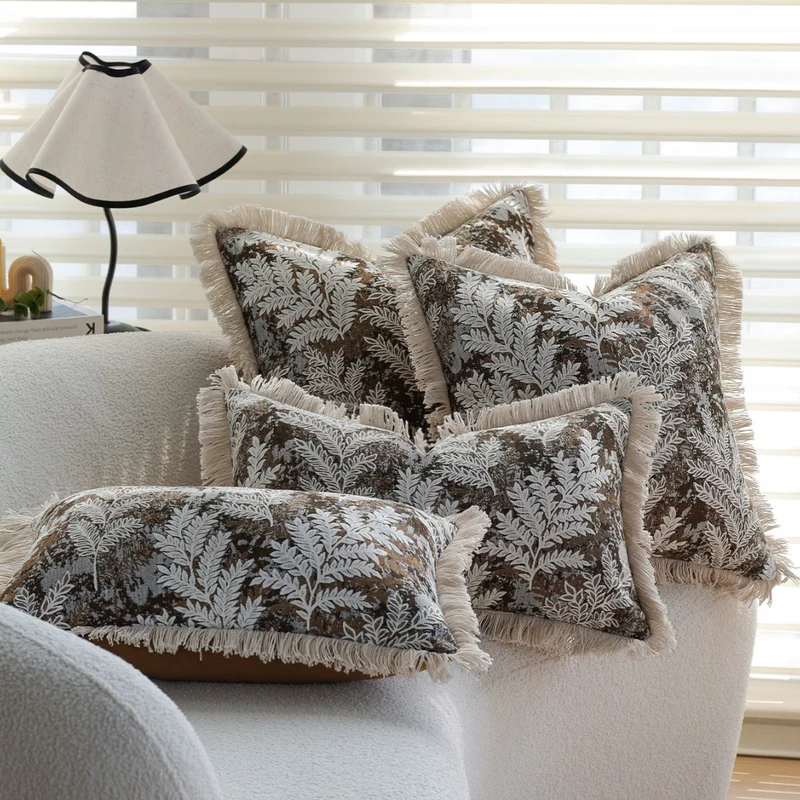 Rectangular decorative cushion cover with embroidered leaf jacquard and fringe edge Stornfield