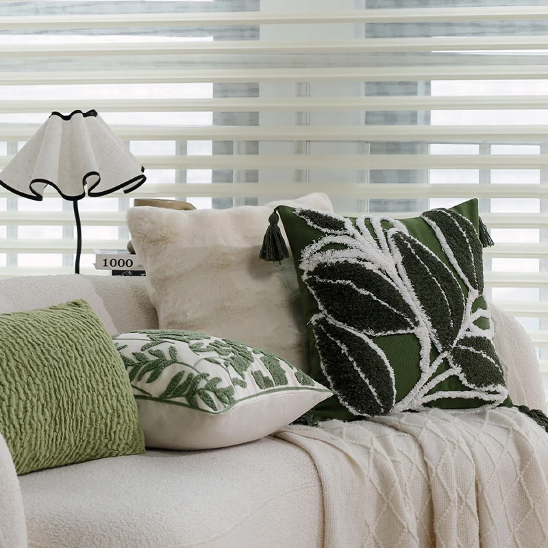 Square decorative cushion with raised leaf tufting and tassels Stornfield