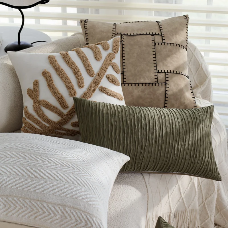 Square decorative cushion cover with tactile herringbone tufting made of cotton blend Stornfield