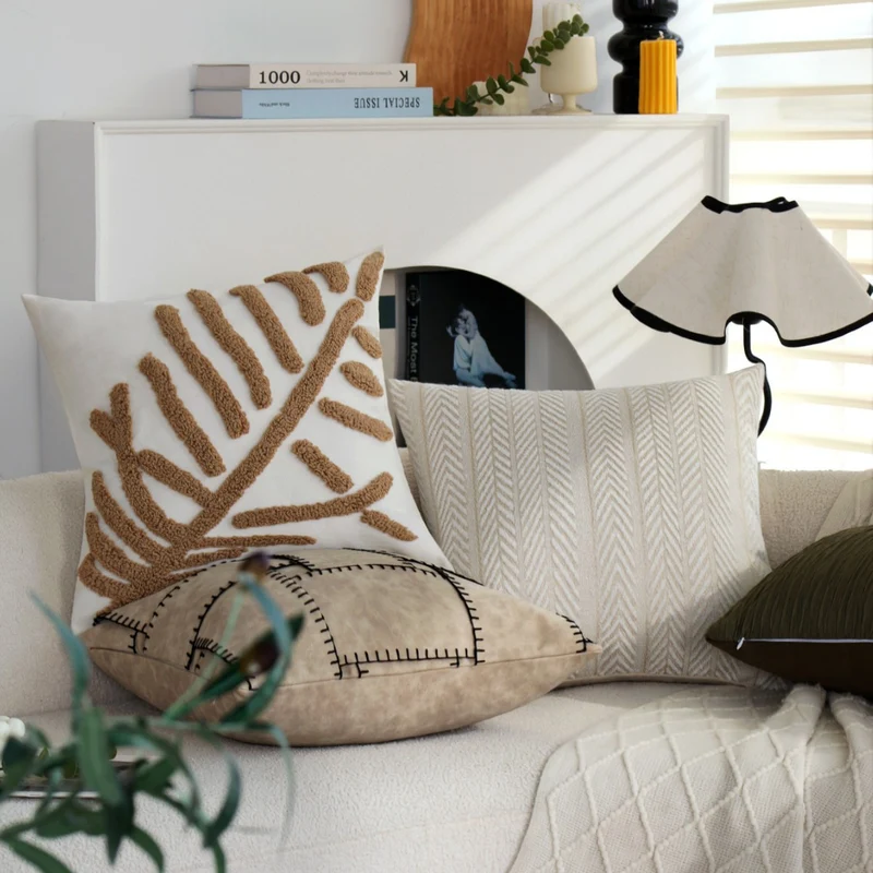 Square decorative cushion cover with tactile herringbone tufting made of cotton blend Stornfield
