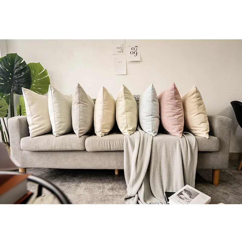 Square decorative pillow cover with micro-structured dot binding and concealed zipper Stornfield