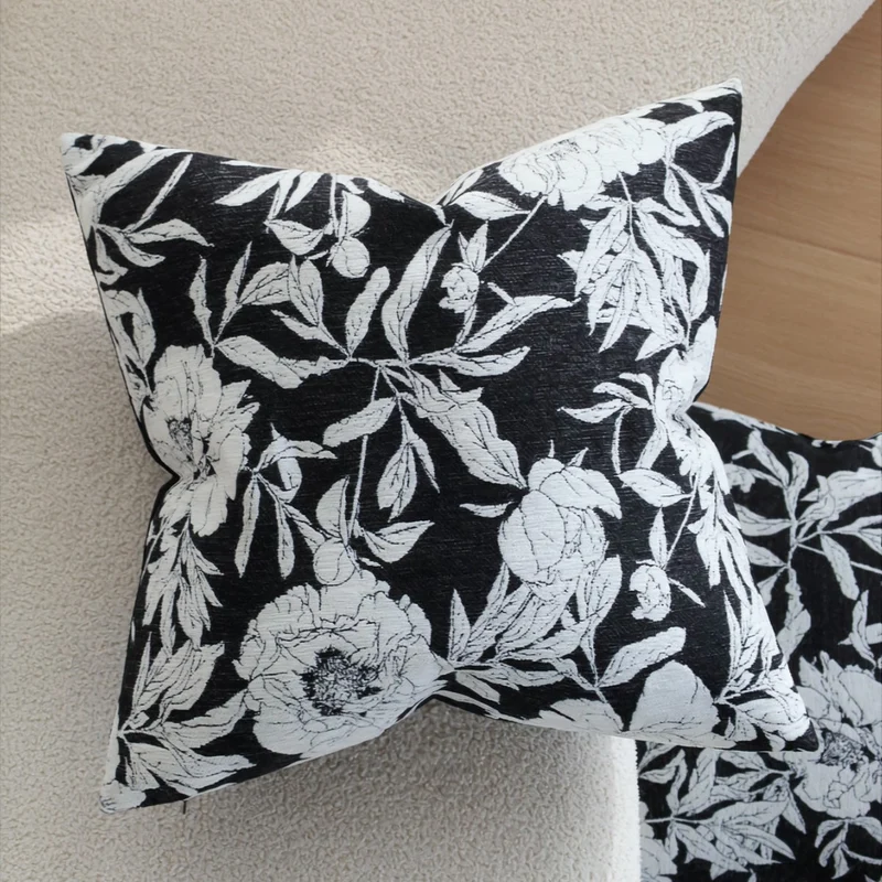 Square decorative pillow cover with contrasting botanical line print and soft linen-mix Stornfield