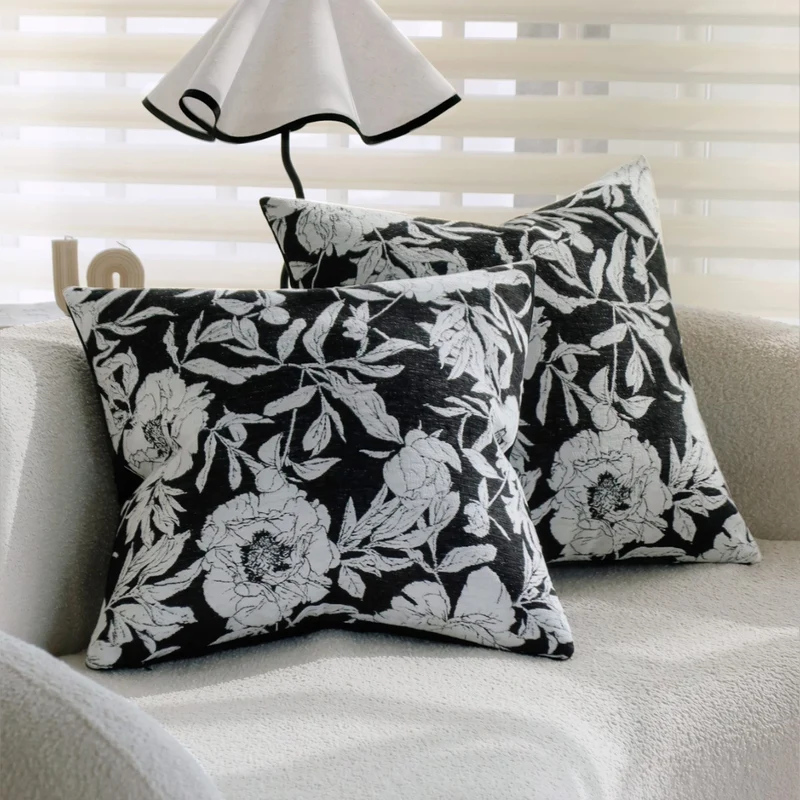 Square decorative pillow cover with contrasting botanical line print and soft linen-mix Stornfield
