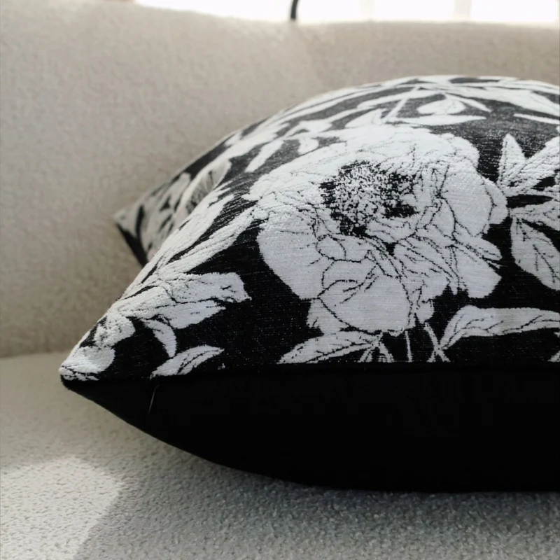 Square decorative pillow cover with contrasting botanical line print and soft linen-mix Stornfield