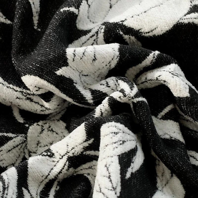 Square decorative pillow cover with contrasting botanical line print and soft linen-mix Stornfield