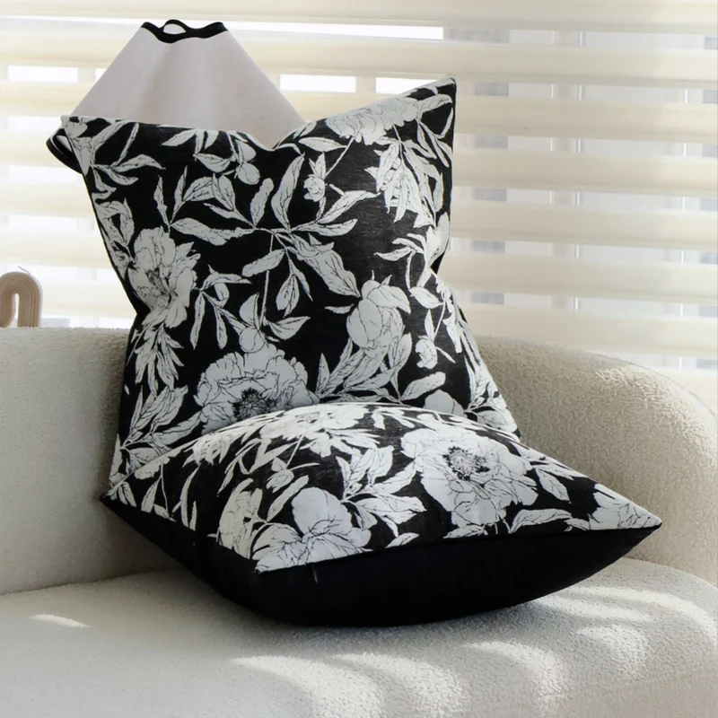 Square decorative pillow cover with contrasting botanical line print and soft linen-mix Stornfield