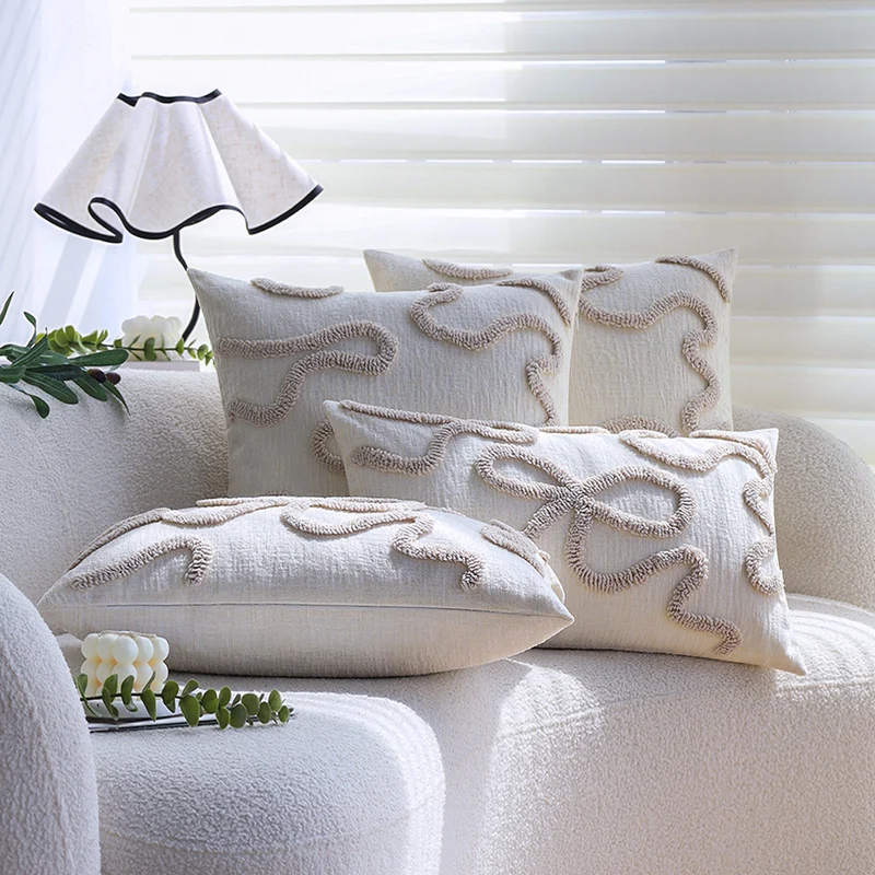 Square decorative cushion cover with hand-tufted bow and wave relief made of cotton-linen mix Stornfield