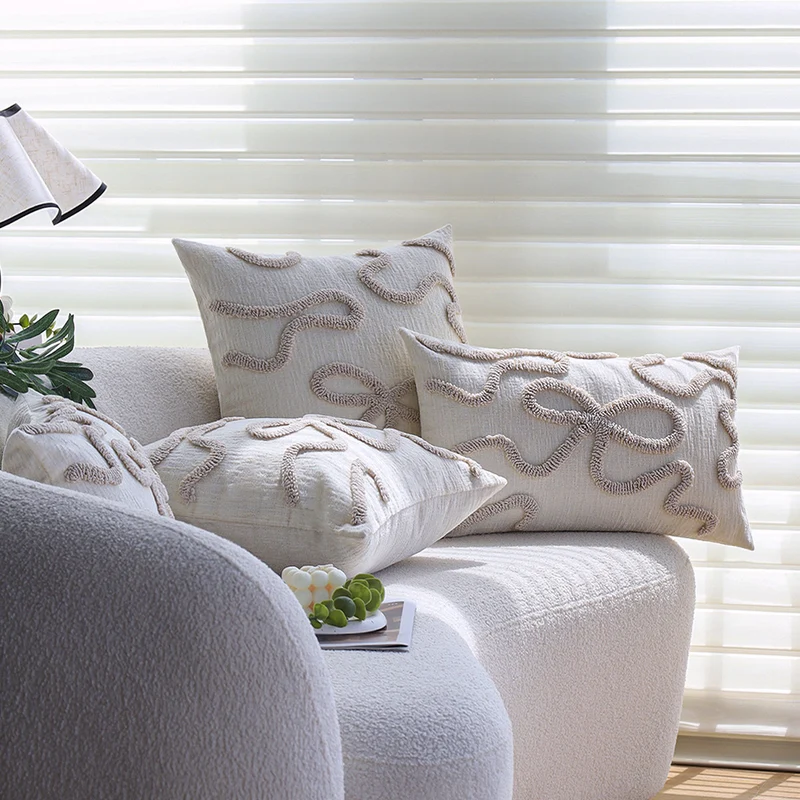 Square decorative cushion cover with hand-tufted bow and wave relief made of cotton-linen mix Stornfield