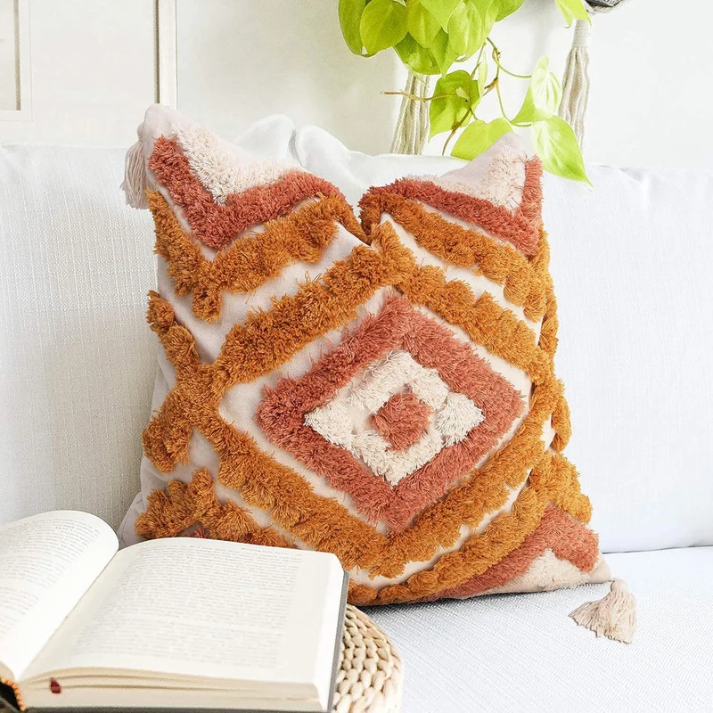 Square decorative cushion cover with hand-tufted diamond relief and decorative corner tassels Stornfield