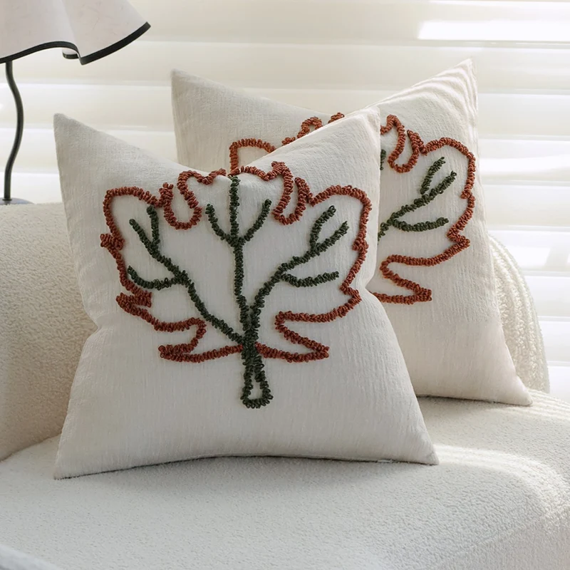 Square decorative pillow cover with hand-tufted leaf motif and fine linen texture Stornfield