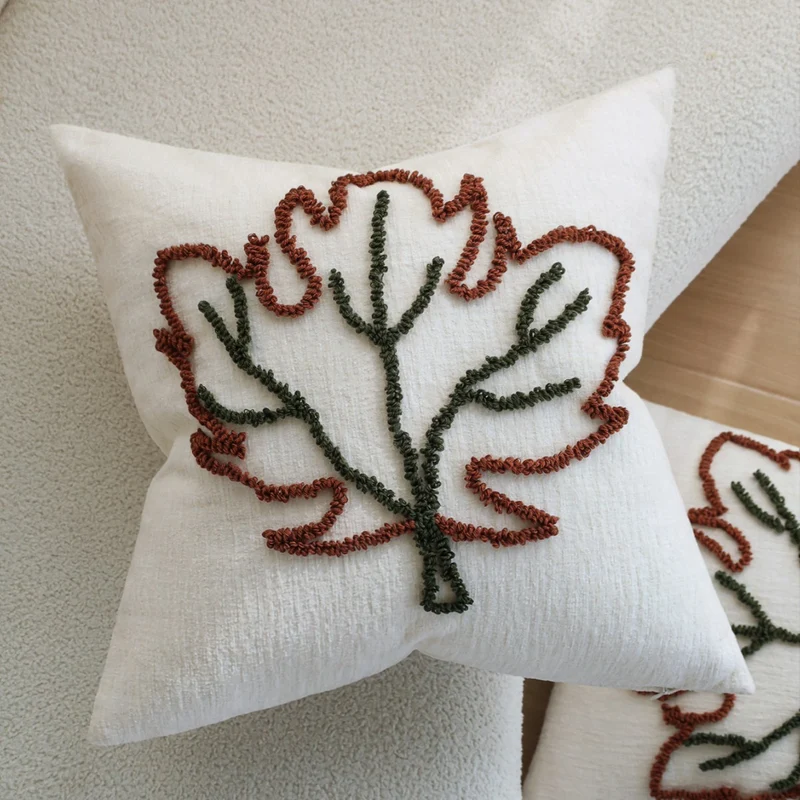 Square decorative pillow cover with hand-tufted leaf motif and fine linen texture Stornfield