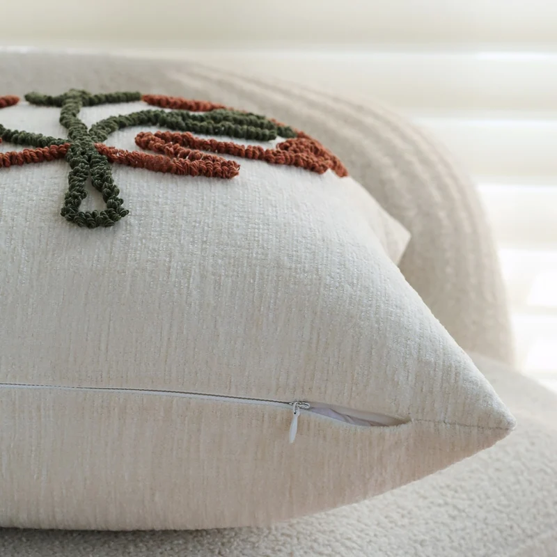 Square decorative pillow cover with hand-tufted leaf motif and fine linen texture Stornfield