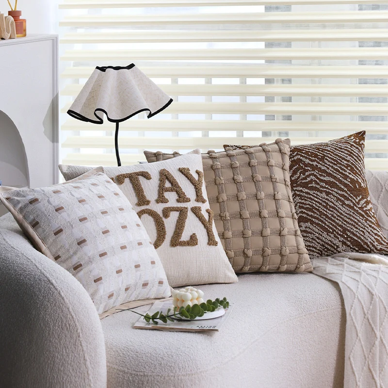 Square decorative cushion cover with woven animal relief and textured cotton blend Stornfield