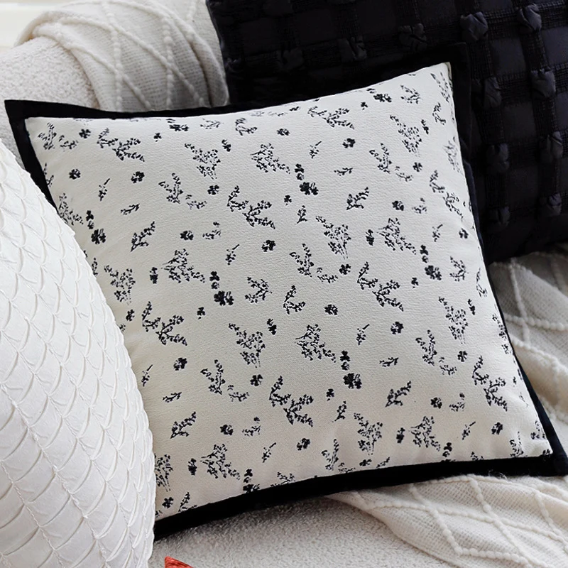 Square decorative cushion cover with subtle floral jacquard texture and elegant piping Stornfield