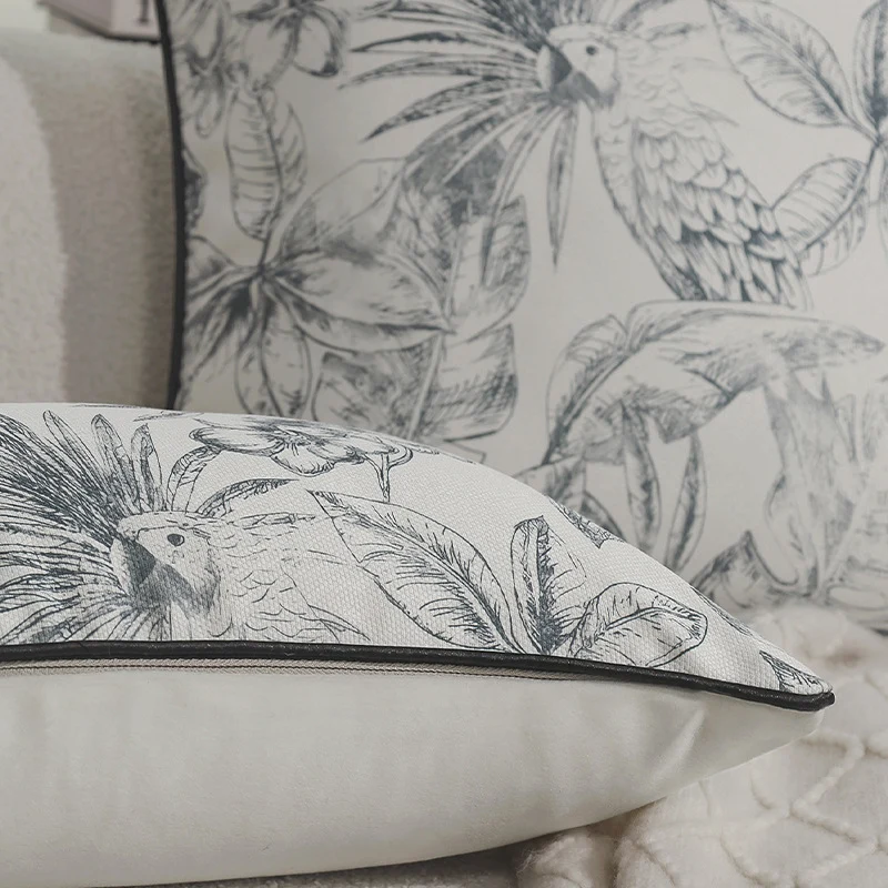 Square decorative cushion cover with botanical parrot illustration print and fine piping Stornfield
