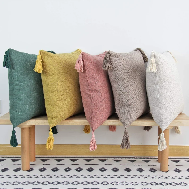 Square decorative cushion cover in linen look with corner tassels Stornfield