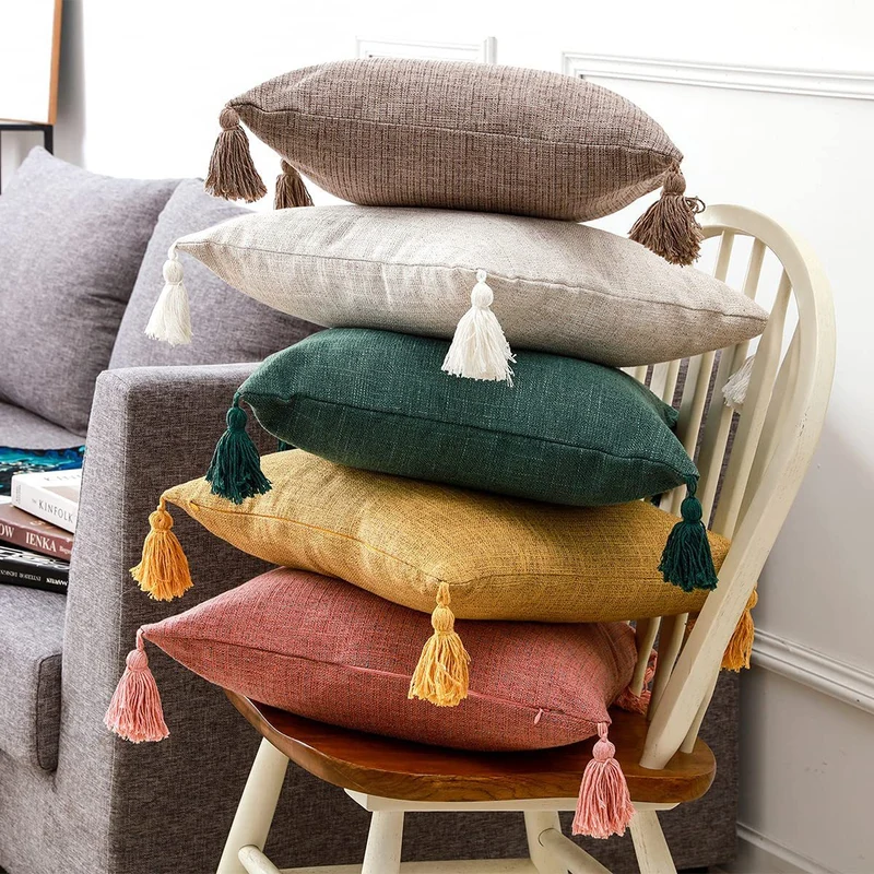 Square decorative cushion cover in linen look with corner tassels Stornfield