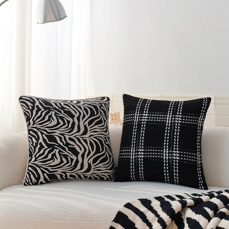 Square decorative cushion cover in tweed look with woven plaid texture and fine boucle feel Stornfield