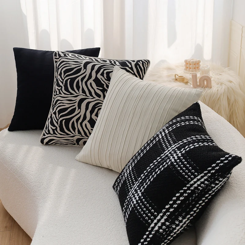 Square decorative cushion cover in tweed look with woven plaid texture and fine boucle feel Stornfield