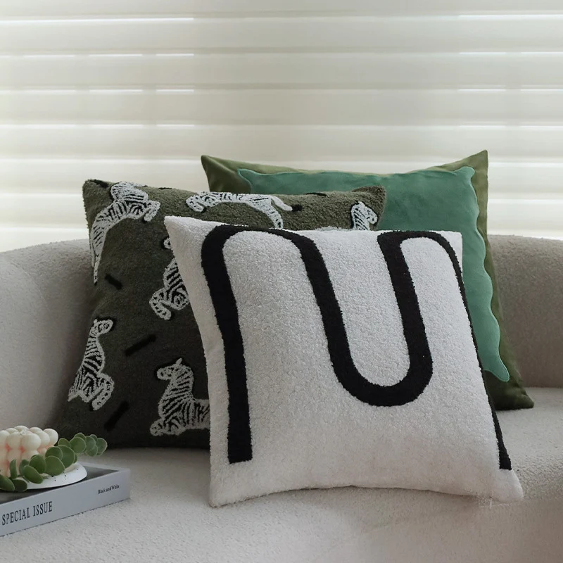 Square decorative cushion cover in teddy bouclé with raised zebra tuft appliqué Stornfield