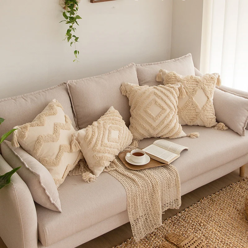 Square decorative pillow cover in Boho Chic with 3D diamond tufting, corner tassels and cotton-linen blend Stornfield