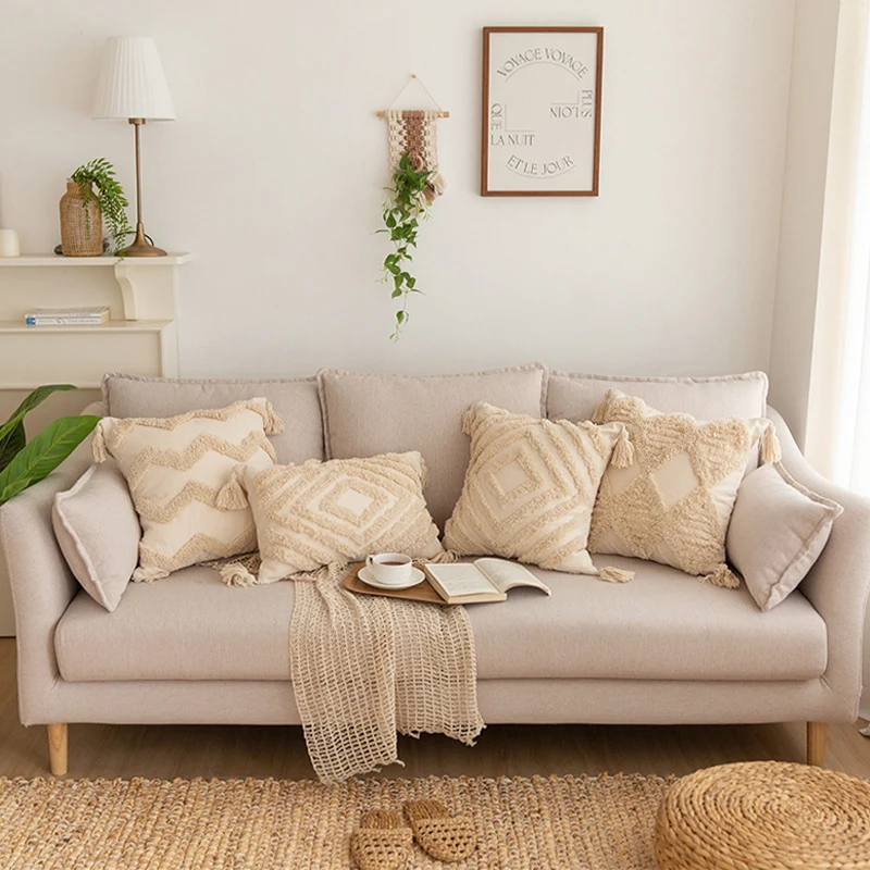 Square decorative pillow cover in Boho Chic with 3D diamond tufting, corner tassels and cotton-linen blend Stornfield