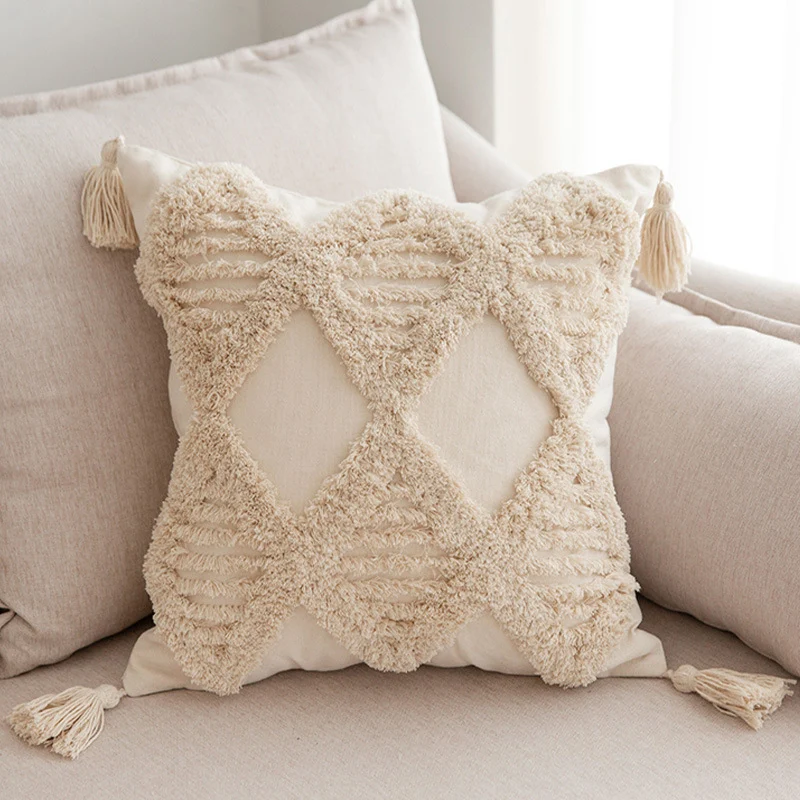 Square decorative pillow cover in Boho Chic with 3D diamond tufting, corner tassels and cotton-linen blend Stornfield