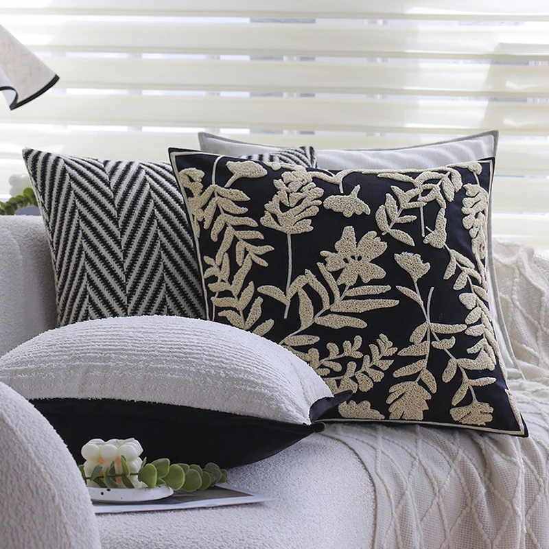Square cushion cover with subtle herringbone texture and surrounding piping seam Stornfield