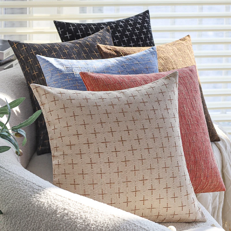 Square cushion cover in Scandinavian minimal style with woven cross pattern and natural linen look Stornfield