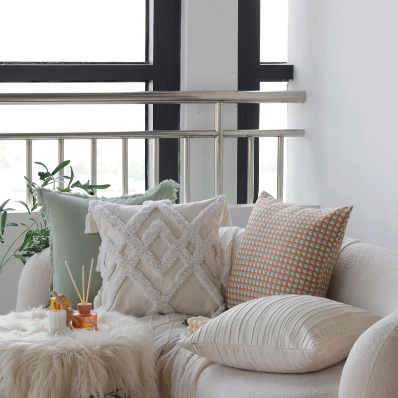 Square cushion cover in boho style with 3D tufting, tassels and soft cotton texture Stornfield