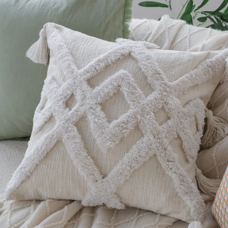 Square cushion cover in boho style with 3D tufting, tassels and soft cotton texture Stornfield