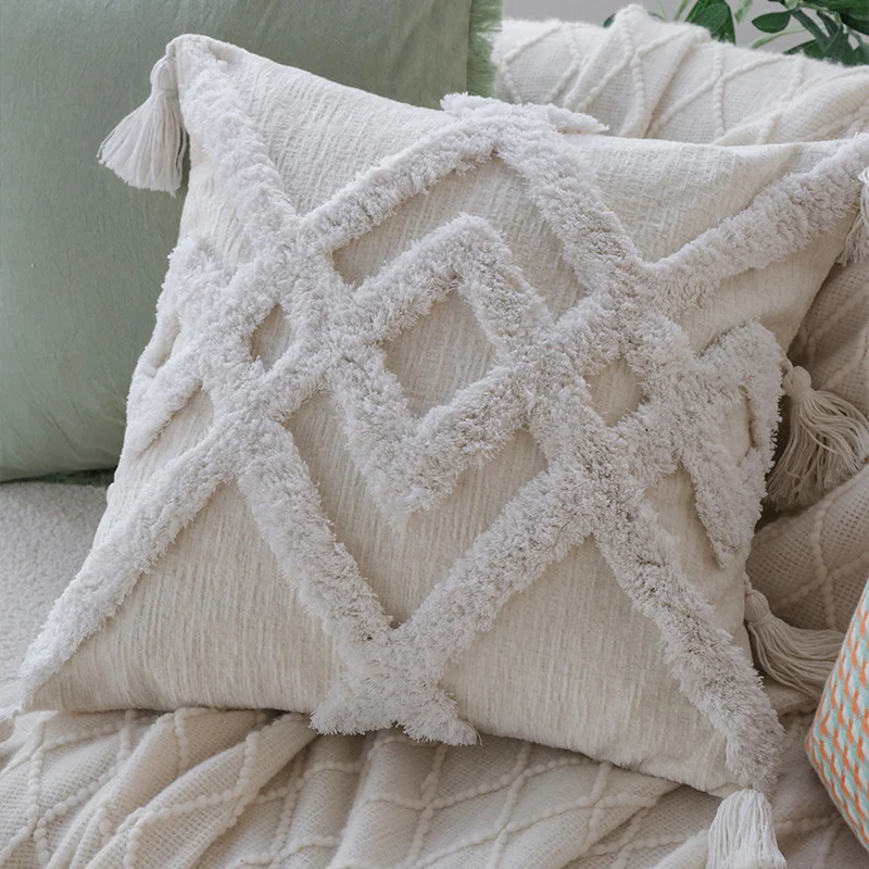 Square cushion cover in boho style with 3D tufting, tassels and soft cotton texture Stornfield