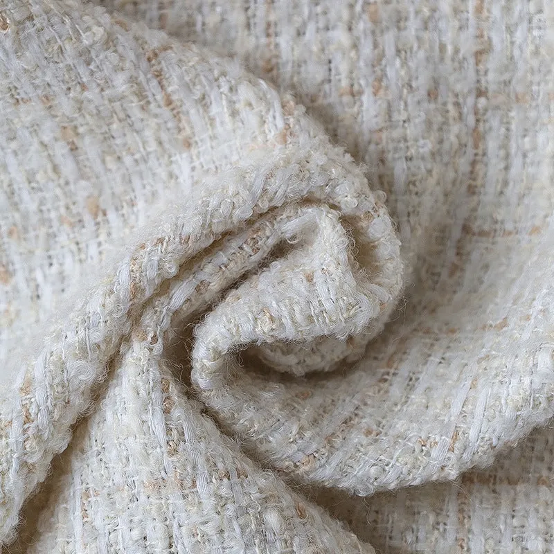 Square cushion cover made of textured bouclé blend with decorative piped seam Stornfield