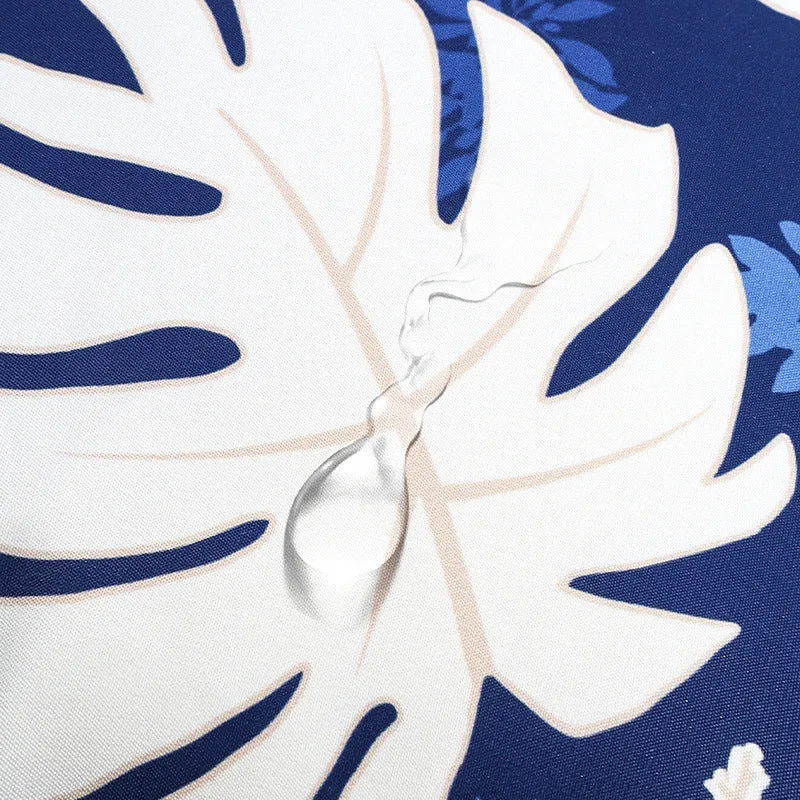 Square outdoor cushion cover with tropical leaf pattern and water-repellent coating Stornfield