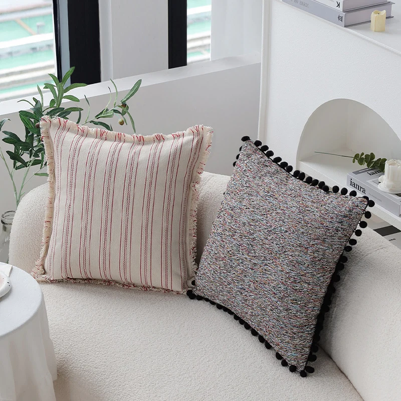 Square cushion cover with pompom trim and mottled boucle structure Stornfield