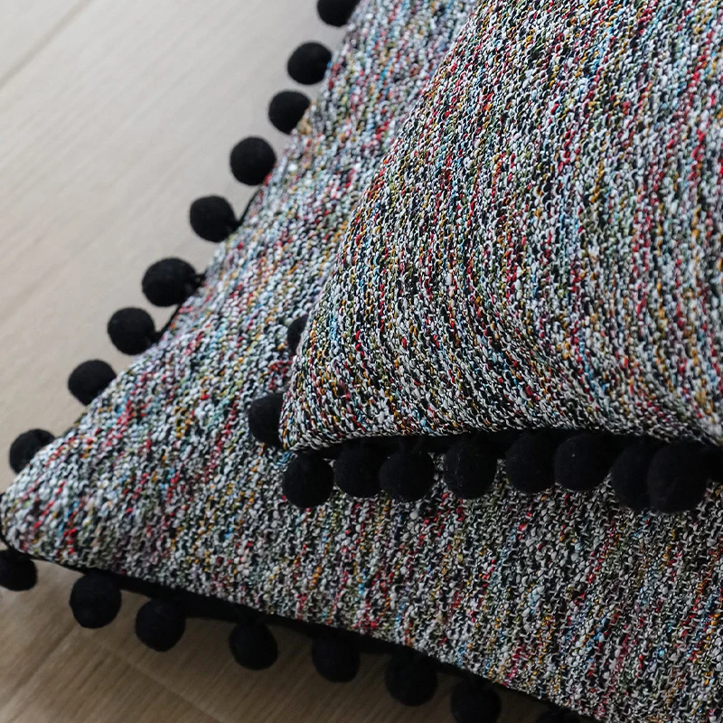 Square cushion cover with pompom trim and mottled boucle structure Stornfield