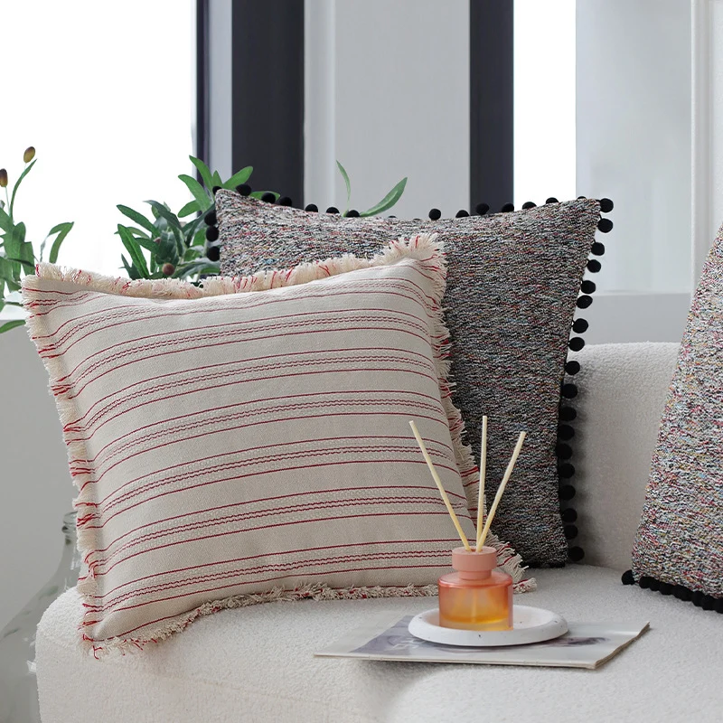 Square cushion cover with pompom trim and mottled boucle structure Stornfield